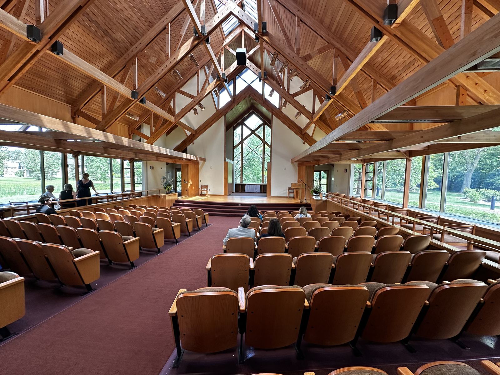 Wedding party moving through an outdoor chapel processional