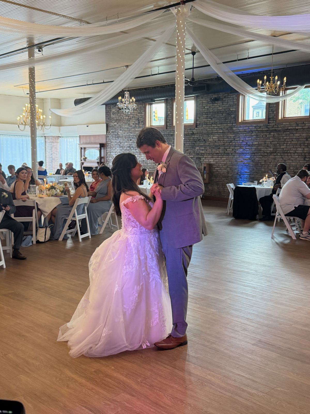 Close view of newlyweds sharing their first dance
