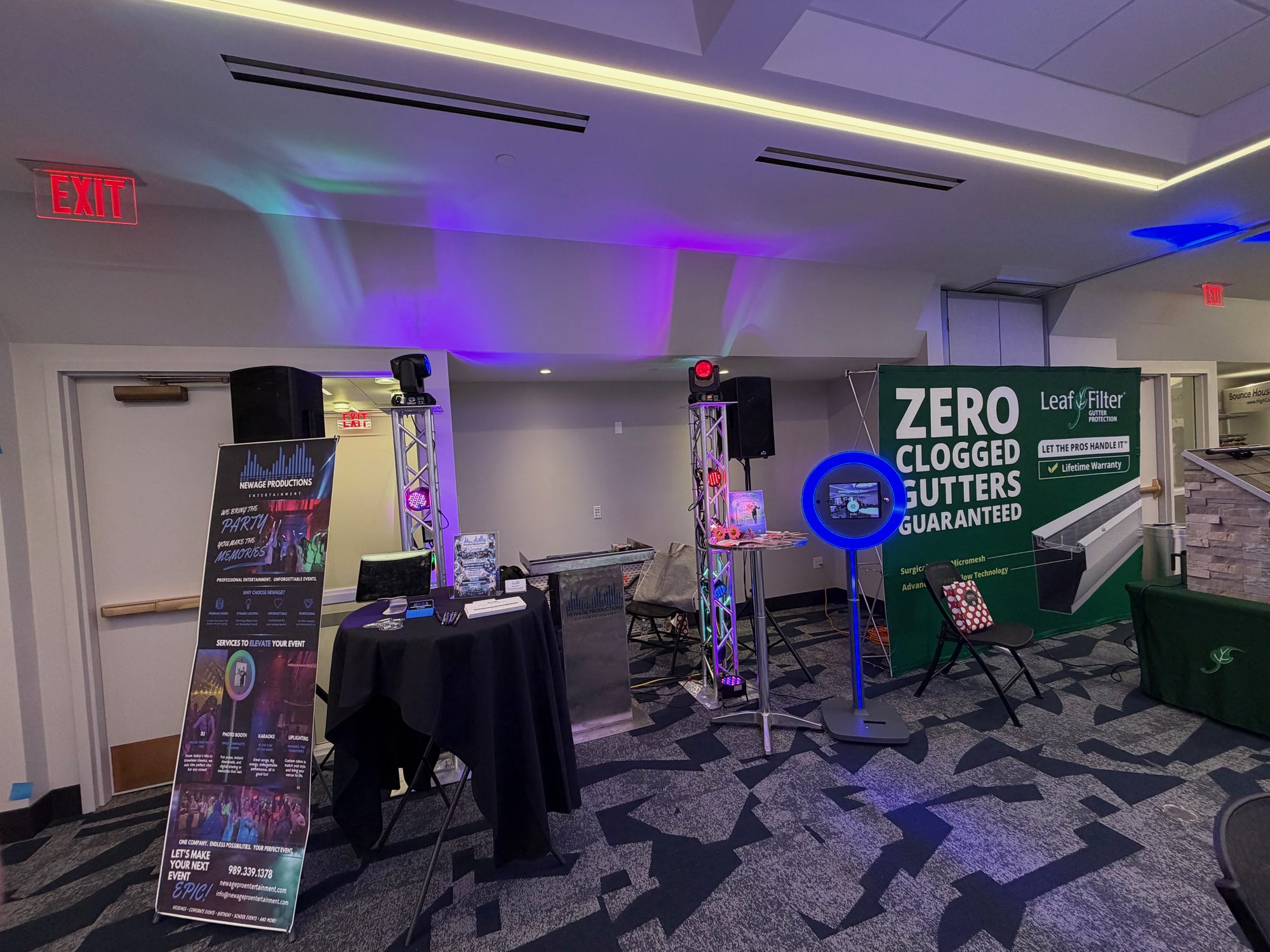 NewAge DJ and photo booth display prepared for a wedding expo