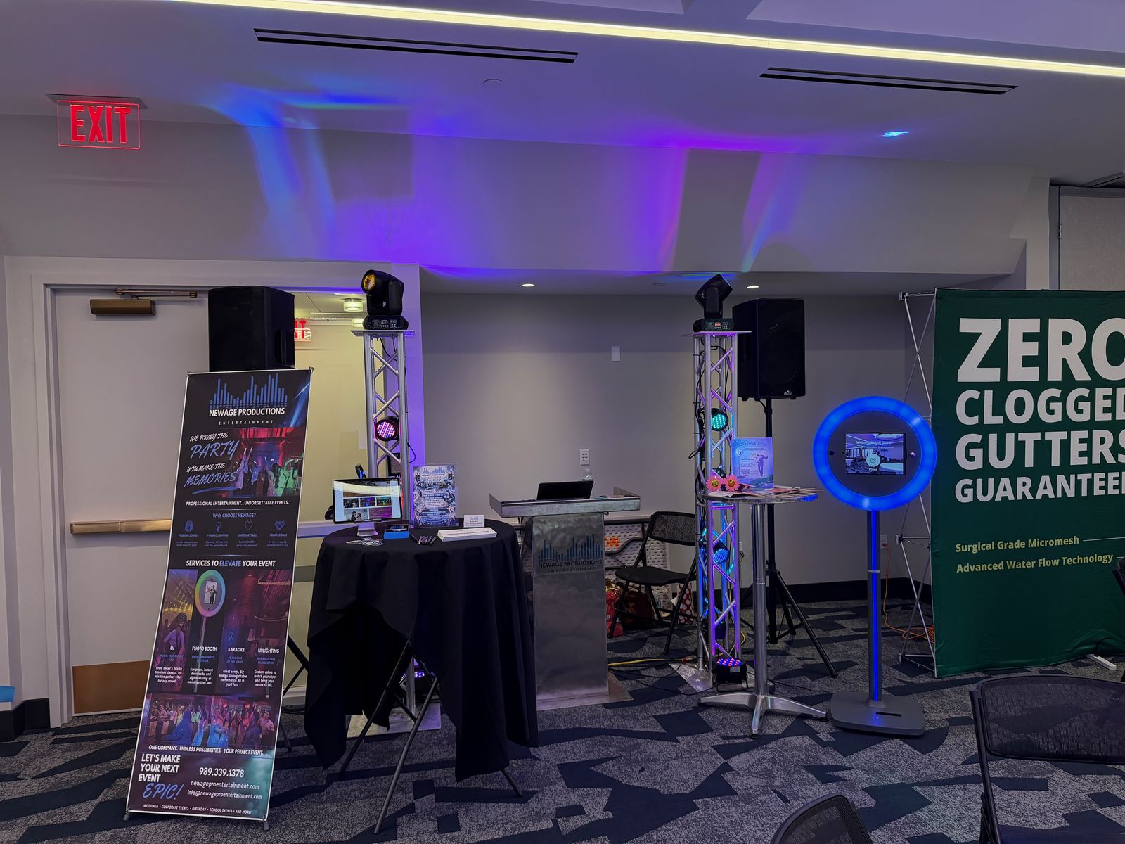 Photo booth and entertainment display prepared for wedding expo guests
